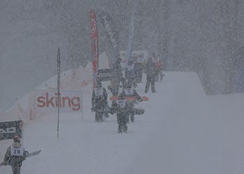Jibbers hiking in a blizzard to compete in the Suzuki Halfpipe Jam. Mount Snow received two feet from the latest storm.  PHOTO: Rob Hudson