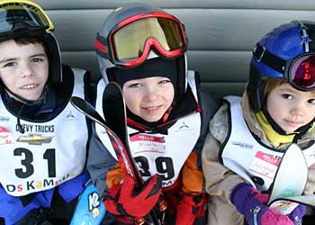 Victoria and Ken smile for the camera on skis in Australia. Donate Here