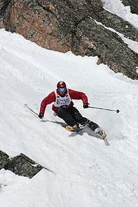 Destination Antarctica: More Skiing Kip, Andrew, John Morrison, and Doug Stoup ascending ice ramp onto glacier.