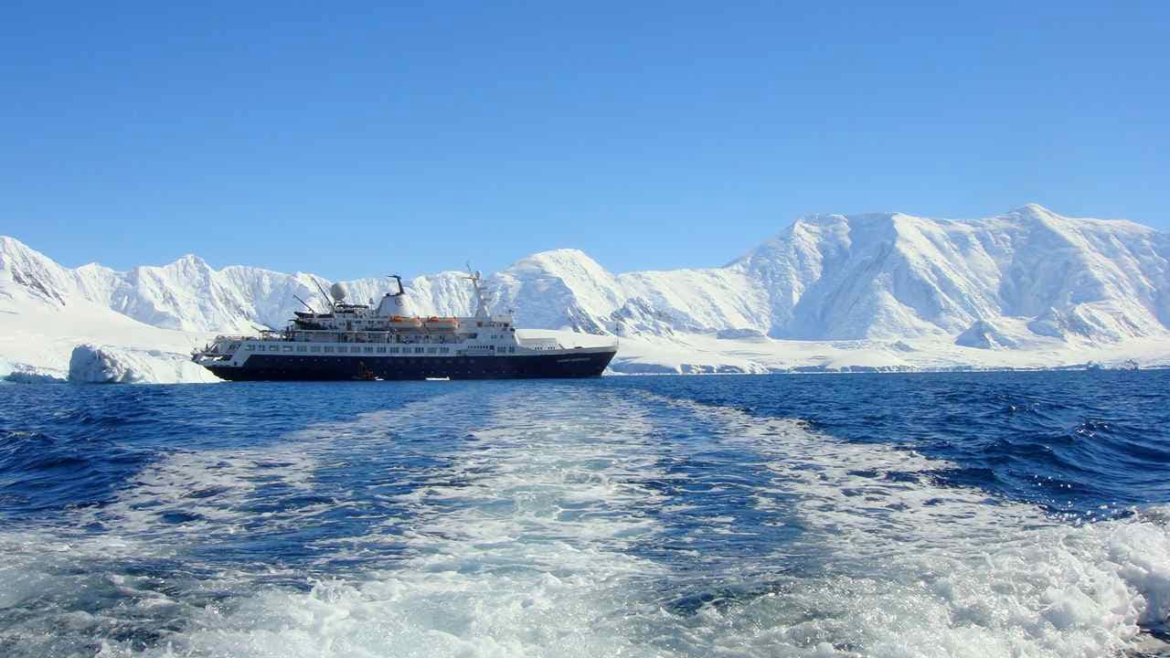 The Ship, Clipper Adventurer M/V Clipper Adventurer as seen from Zodiac speeding toward penguin rookery on Weincke Isand