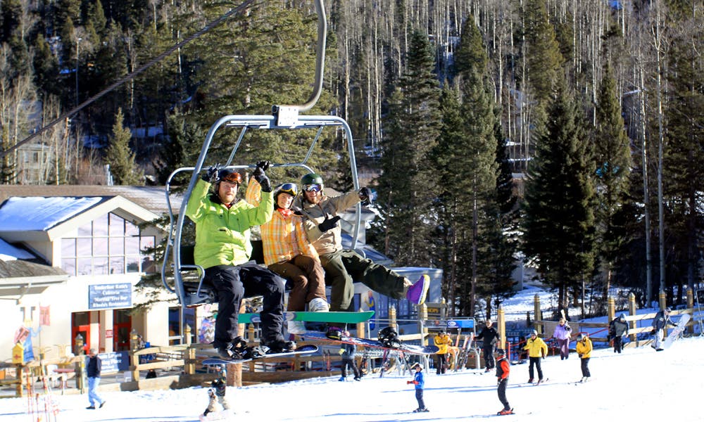 These stoked snowboarders scored a well-deserved first chair for the 2009-2010 season at Taos on Thanksgiving day.