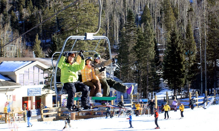 First Chair These stoked snowboarders scored a well-deserved first chair for the 2009-2010 season at Taos on Thanksgiving day.