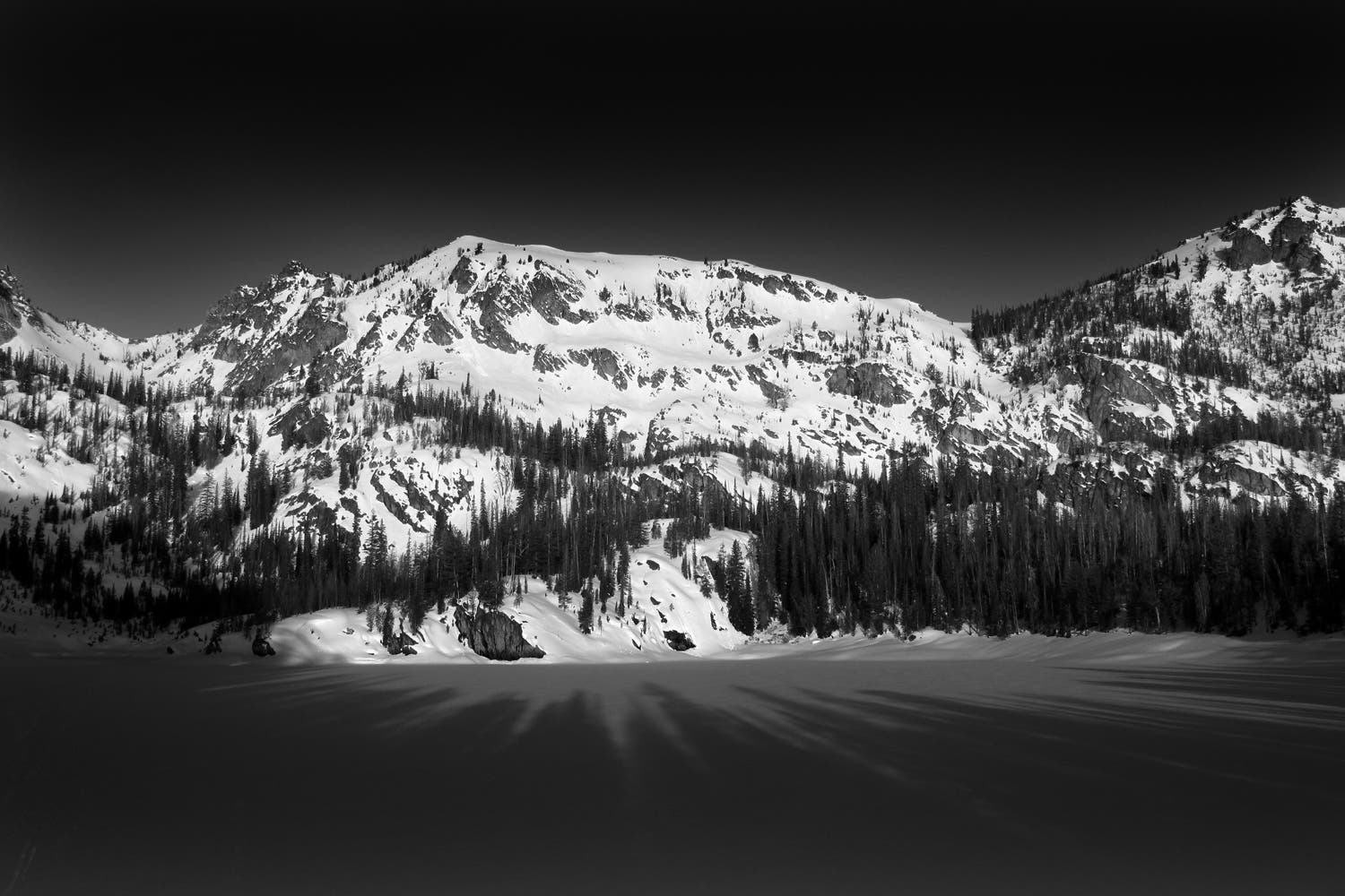 Fourth Lake The next morning we awoke at 5 to beat the heat for what would be a beautiful day of skiing. We would end up gaining the saddle to the left to ski a…
