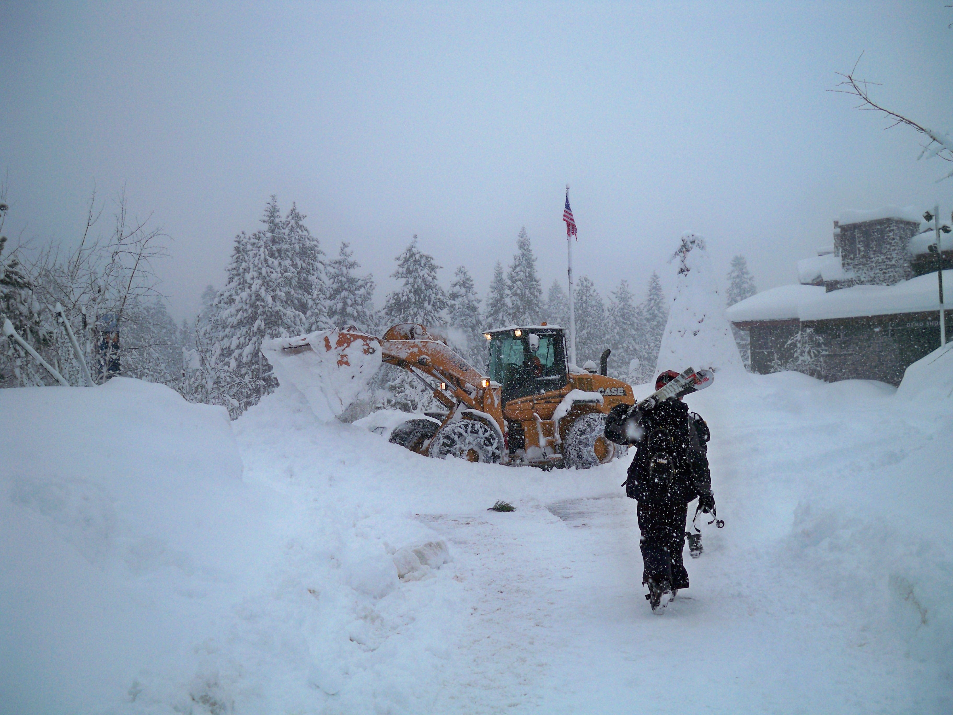 Mammoth Snow Removal When a shovel simply wont do, use a front loader to clear the walkways in front of the gondola.