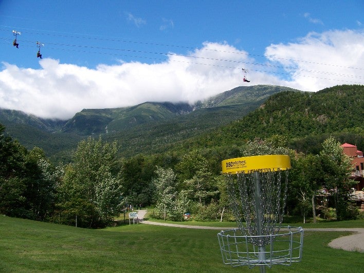 Wildcat Mountain, New Hampshire Ride the lift up to play on Wildcat’s nine holes on their Cheetah, Snowcat Slope, and Wild Kitten trails. For $15, you can rent three discs (driver,…