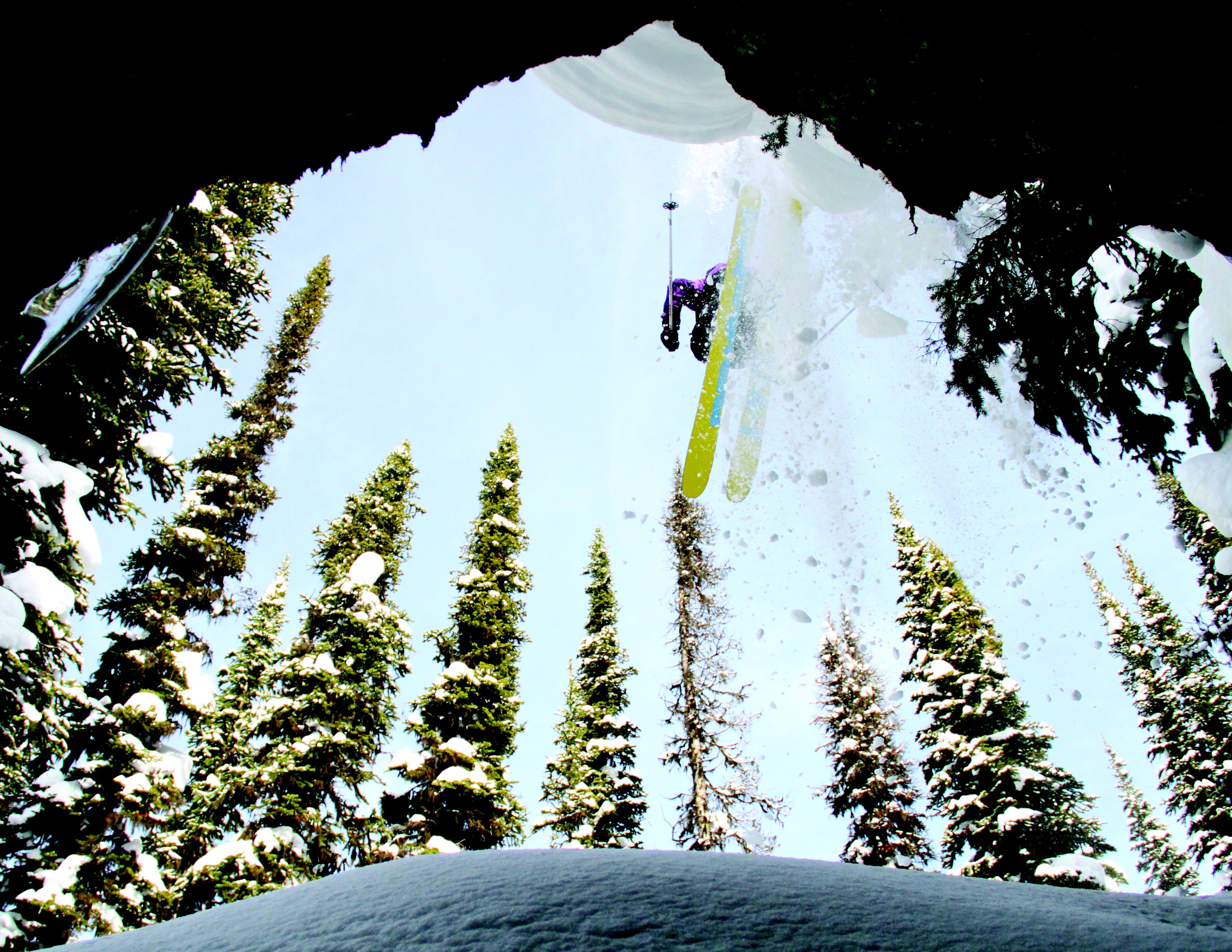 A skier jumps off a cliff at Revelstoke Mountain Resort, British Columbia