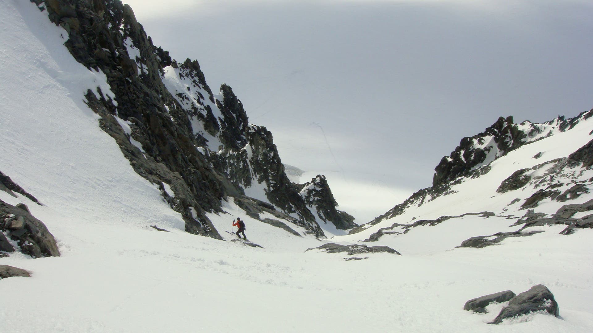 Steve pauses after we negotiate the chute's crux. At this point, my hands have stopped shaking enough to take this picture.