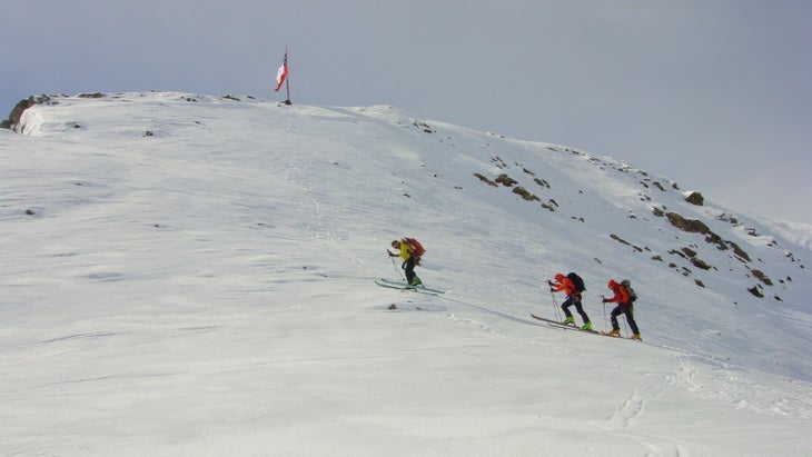 Final Day Glen, Steve, and Scott ascend the backside of a peak we skied on the final afternoon of our journey. I think this was on Greenwich Island in the…
