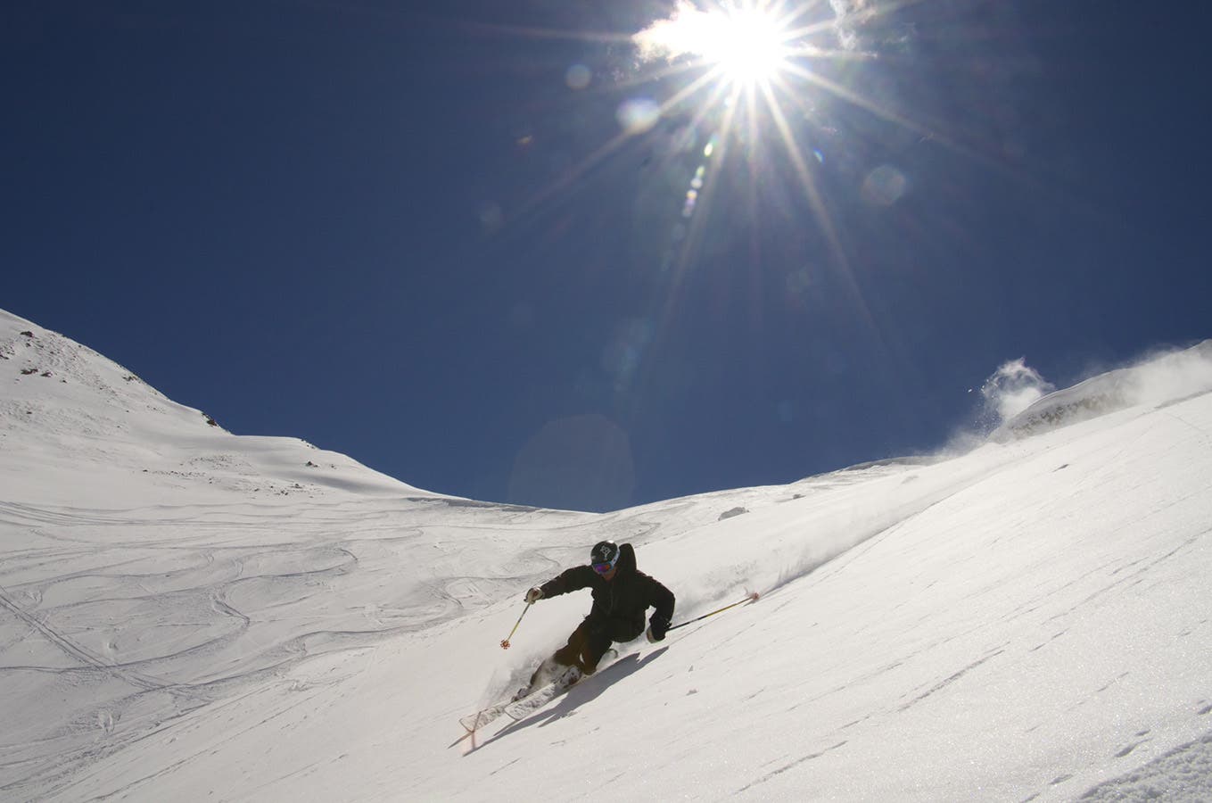 Bluebird, Anyone? If you feed ski patrollers free brats, you get the inside scoop on when ropes were dropping. It paid off. Skier: Doug Evans
