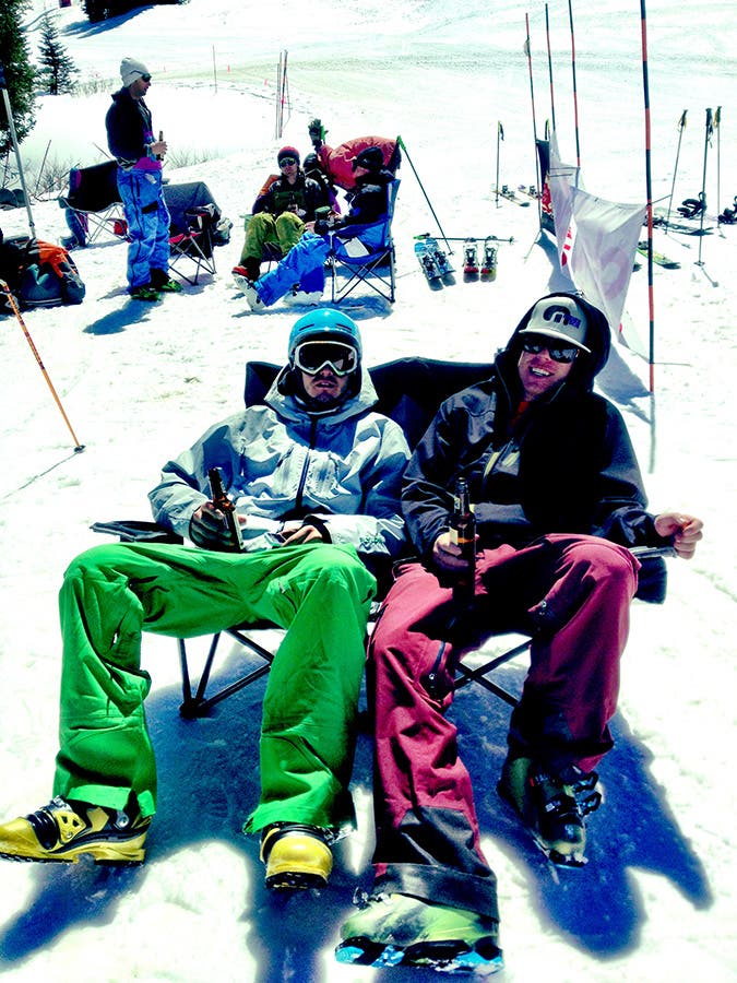 Catchin' Some Rays From Left to Right, Alex Paul from RMU Skis and Chris Dean from Meier are snuggling on a Kelty loveseat.