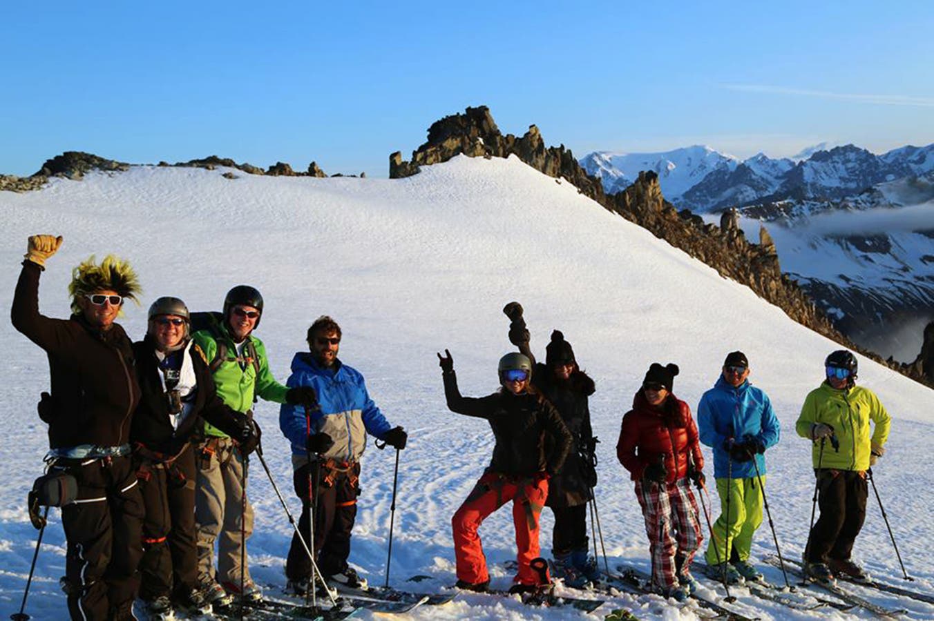 Celebration A group celebrates the summer solstice by skiing.