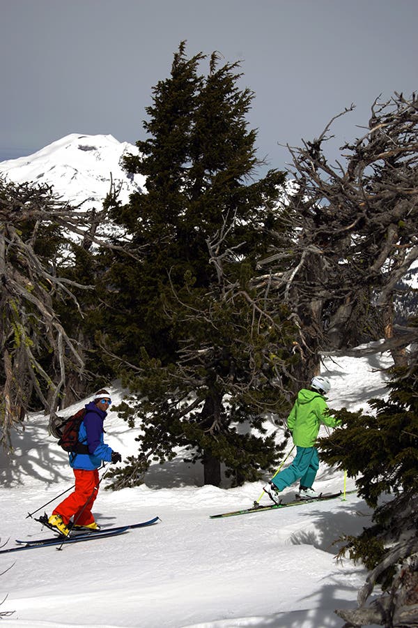 Alpine or AT Hike mode boots this year fell into two main categories: they either had alpine DIN soles or they didn't. Here Brian Elling, left, skins in the…