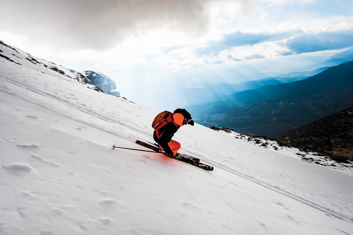 Josh lays over a smooth turn after a bumpy horse ride through Greece’s rugged landscape.