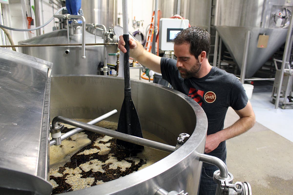 With the last of the dry ingredients added and the smell of oatmeal in the air, it was time to filter the beer and settle it in the hot holding tank.