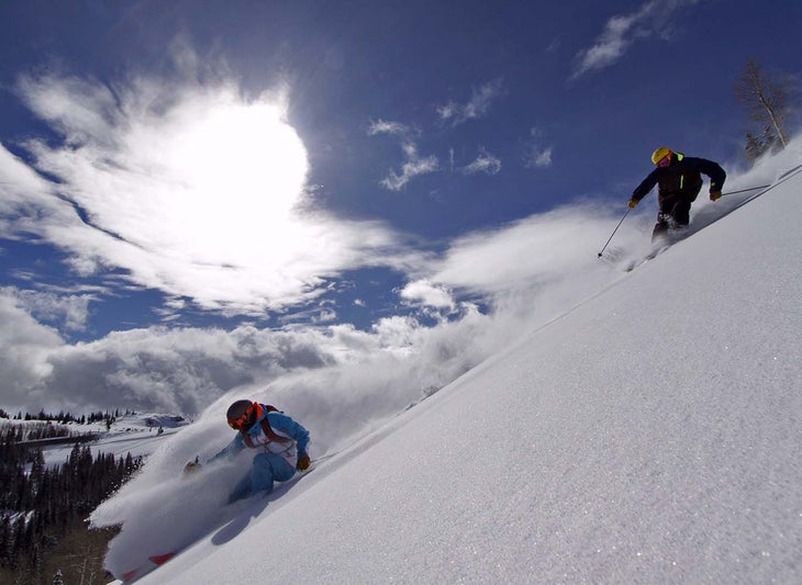 Pow Chasing Tim Dyer and Barclay Rabin kick up some snow. These guys always know where to find it.
