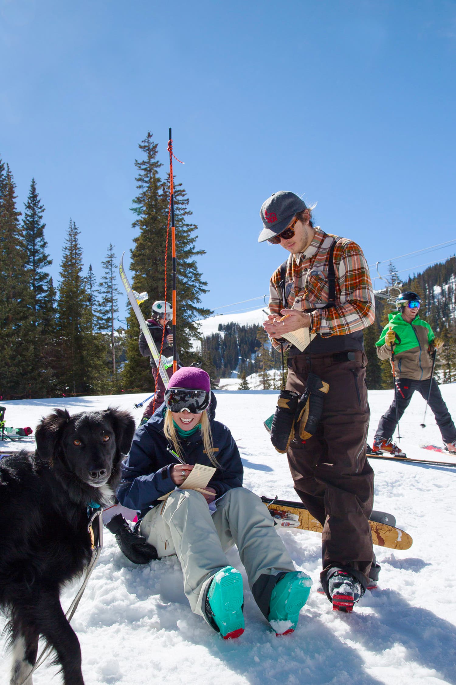 Kellyn Wilson and Cody Cirillo pause between laps to fill out cards and hang with Cash, our official indie test mascot. 