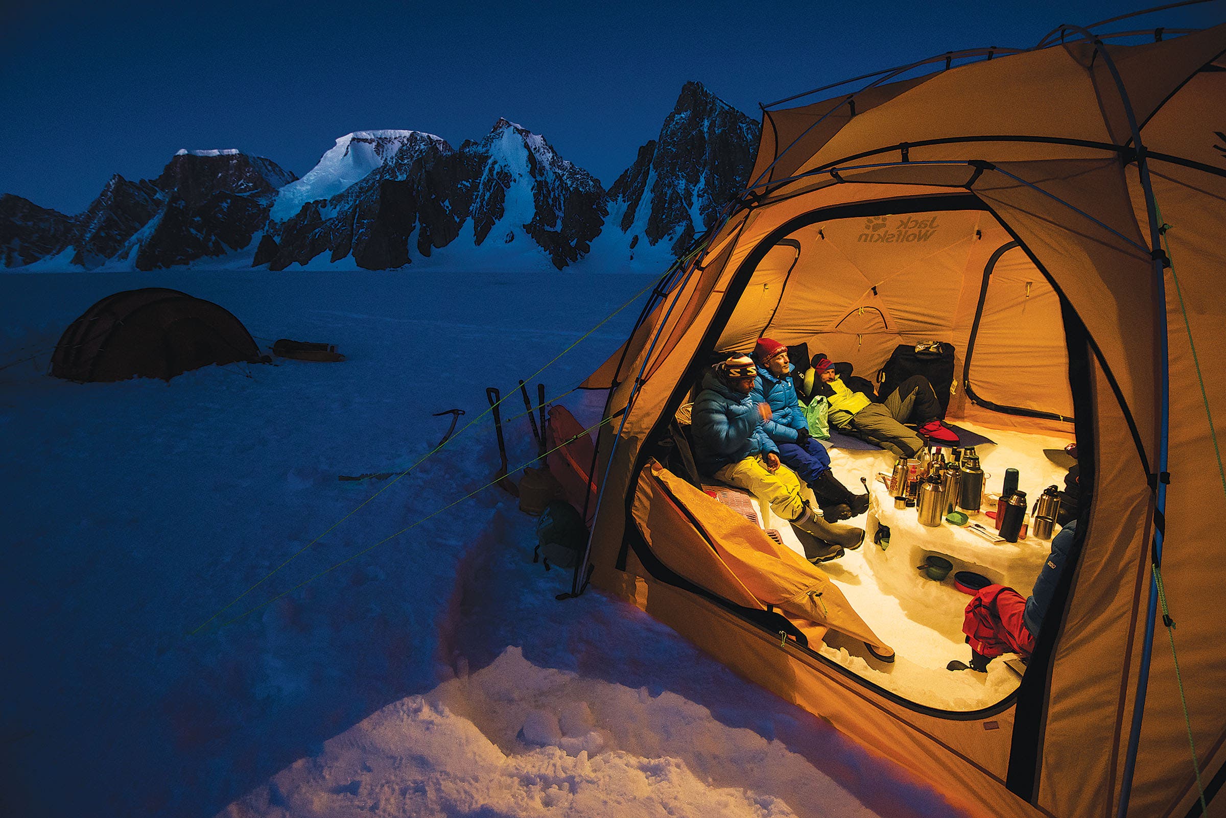 Chilling at Camp 1. This shot was taken around 11 p.m. in Greenland’s “perpetual afterglow,” Long says. “This was a pretty regular evening in our…