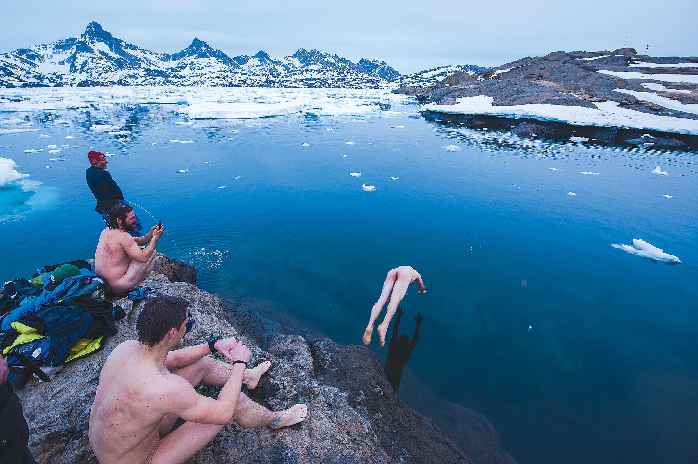 SKG1216_PHO3_Greenland After winter camping for two weeks, Rubens rallied the troops for a polar-bear swim in memory of their friend Andreas Fransson, who died in an…