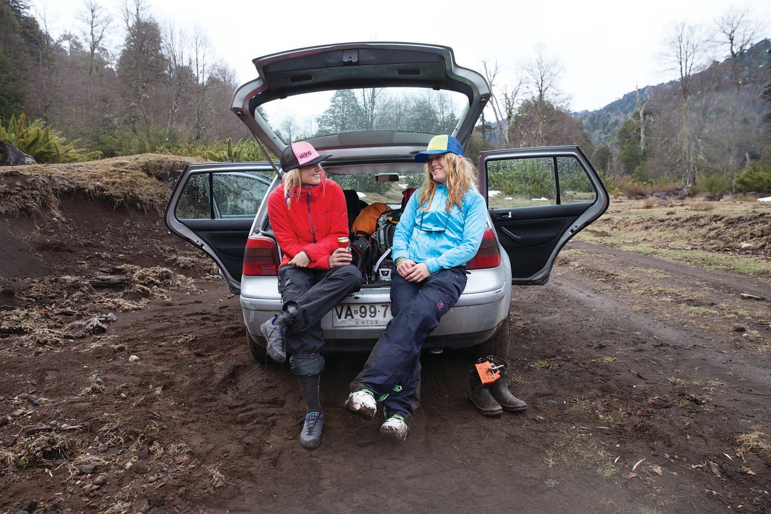 The writer and Alex, tailgating in the mud after a slog.
