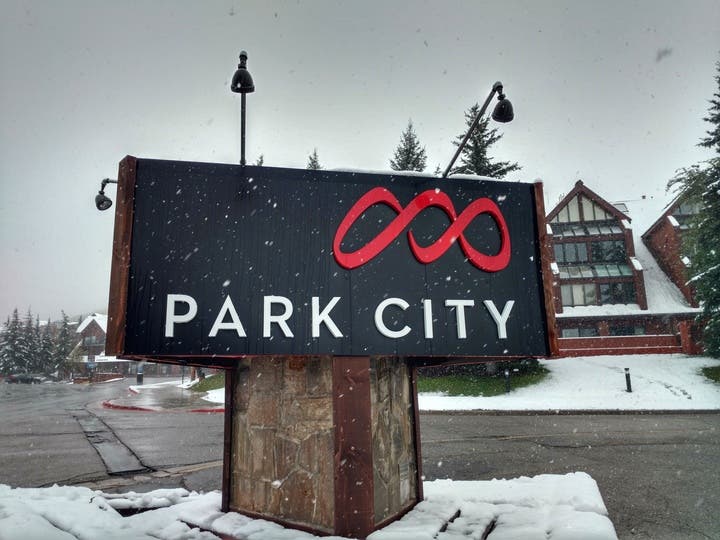 park city sign and snow