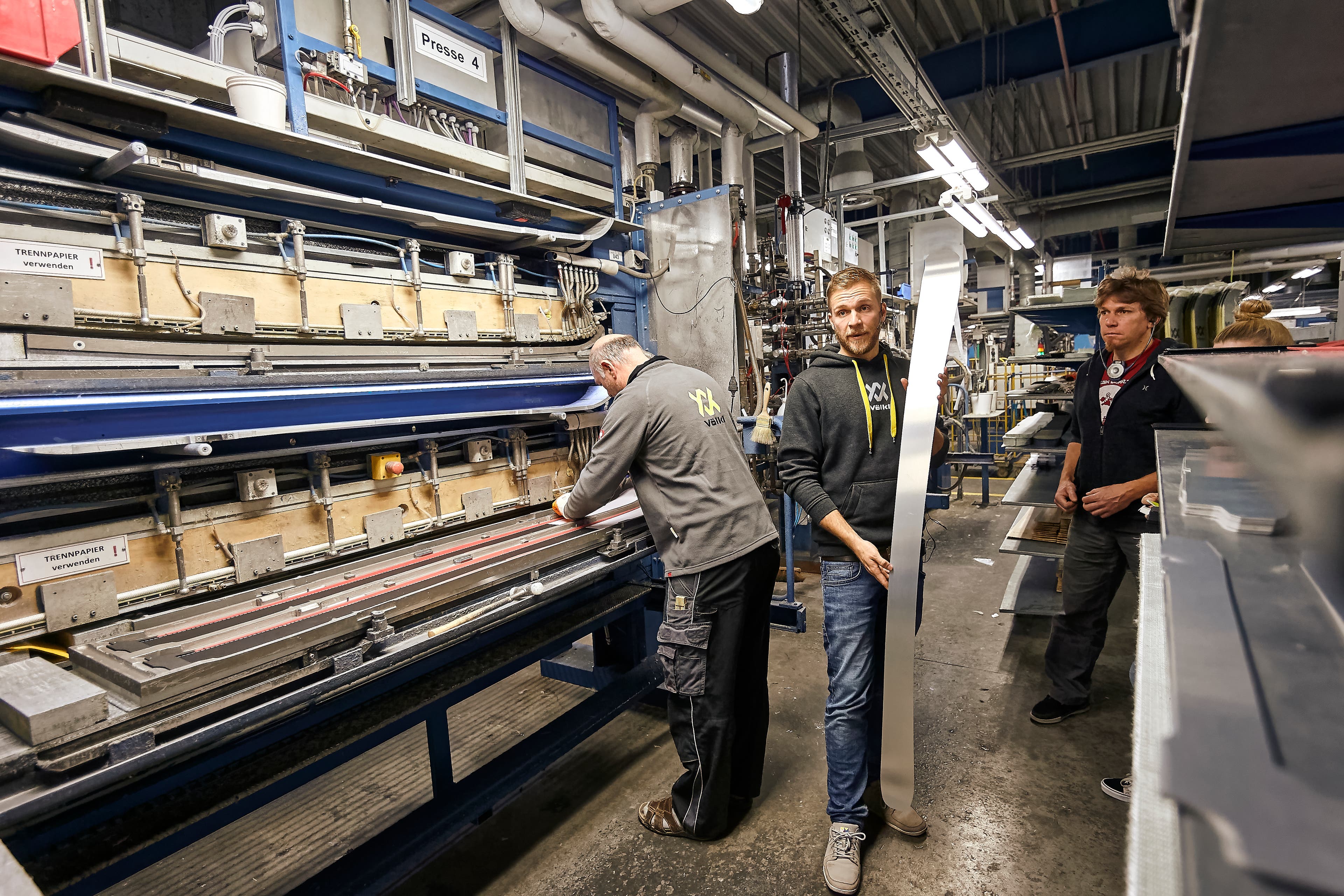 The project lead for the Mantra M5, Dominik Grunert, holds up the full sheet of Titanal, placed under the core, as a pair of Mantra M5s are built…