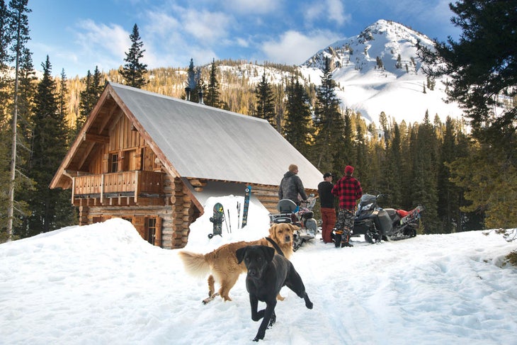 SKI1217_CabinsCompanions_03 The Winterux crew enjoys a break from the clouds after a day blazing trail in the Sawtooth National Forest.