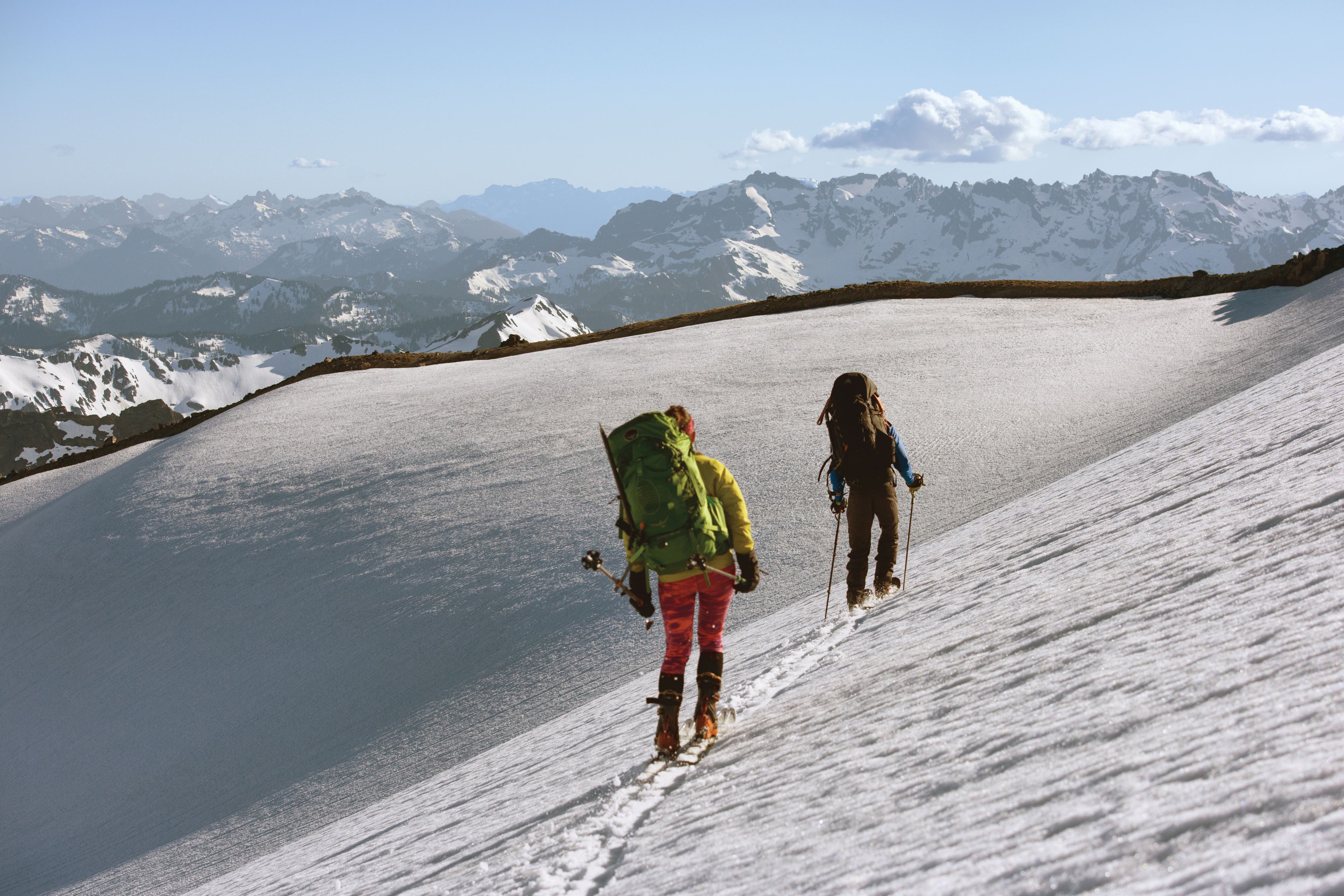 Hummel’s ski partners, Dan Chirpich and Kimberly Ann, trek across Gerdine Glacier.