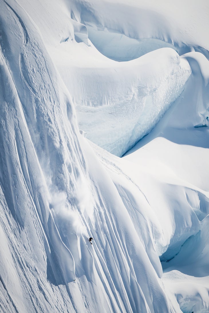 SKI0218_FOC_NicAlegre_v2 STEEPED IN POWDER British Columbia native Nick McNutt attacks a spine wall in the mountains near Petersburg, Alaska. Known as the “Little Norway” of…