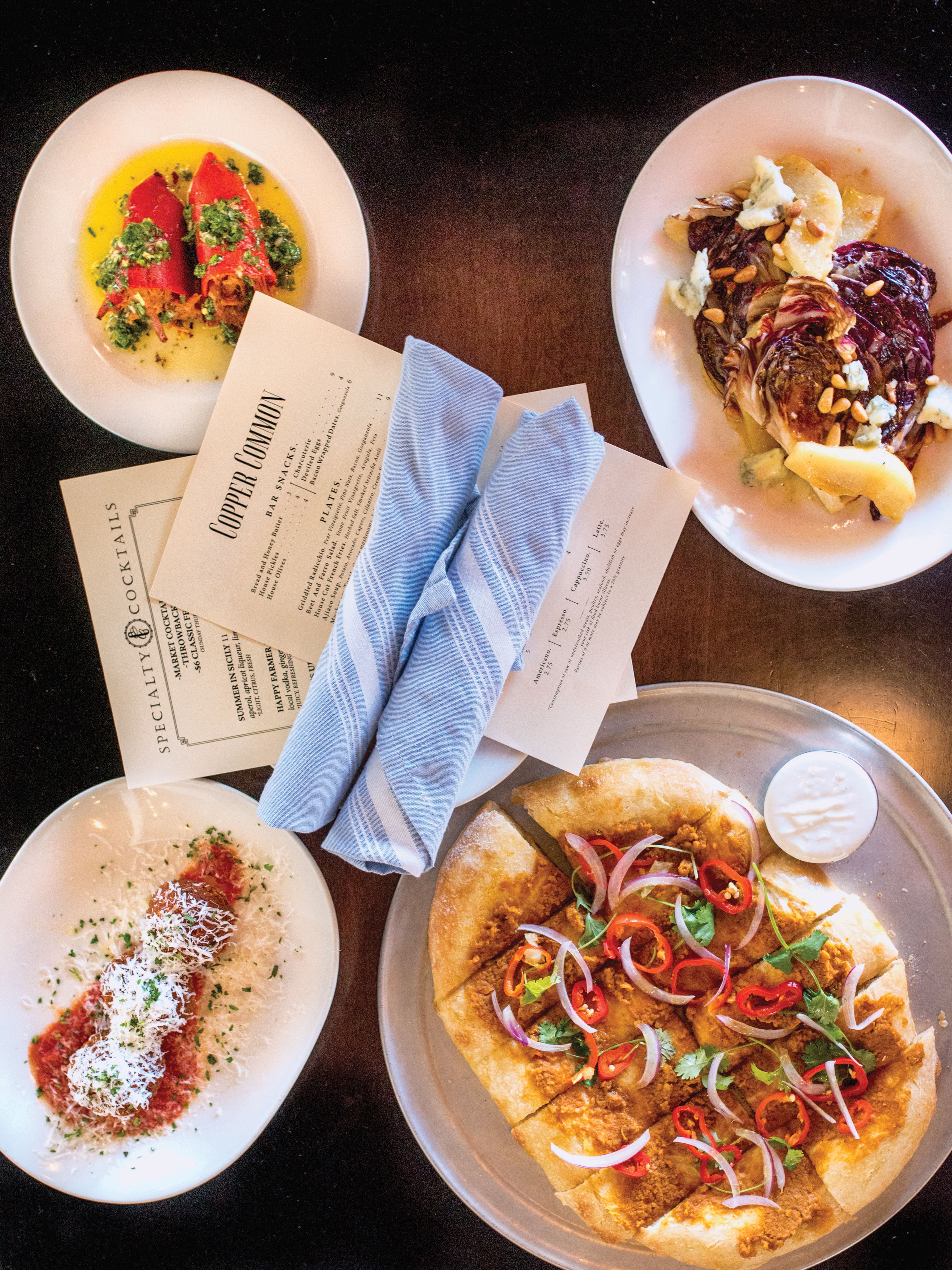 SKI1217_SCE1_coCopperCommon_creditCarolineHargraves Downtown Salt Lake City's Copper Common transforms bar food into exquisite farm-to-table dishes. Think bacon-wrapped dates and savory flatbreads.