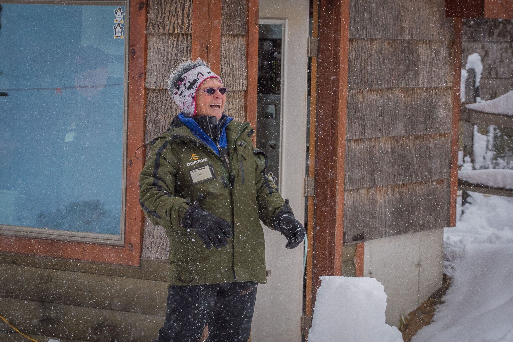 Cindy Whitaker laughs outside the operator's cabin.