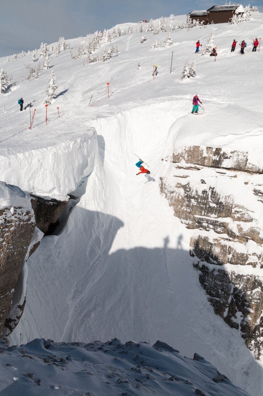 Corbet's Couloir Skier backflips into Corbet's Couloir