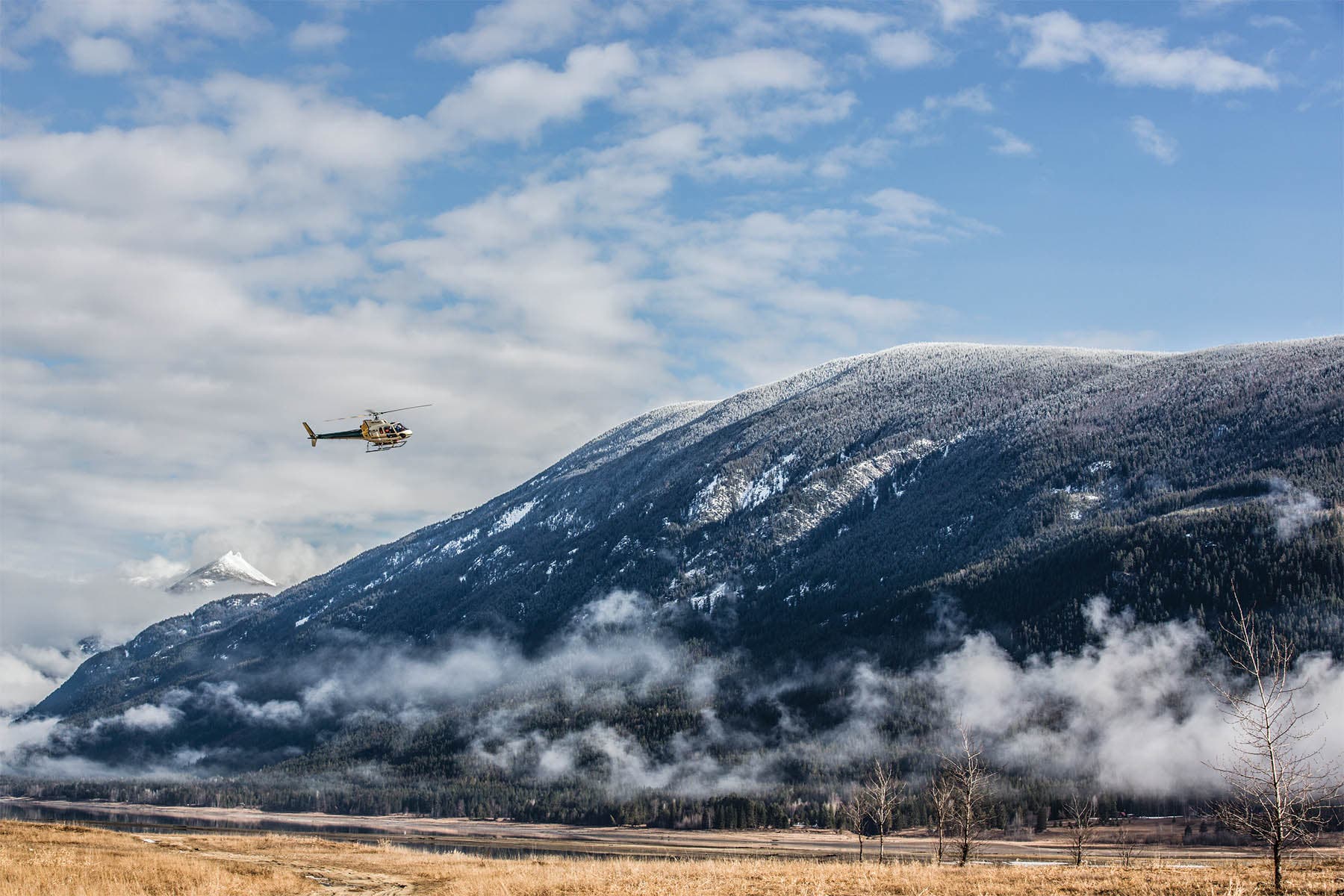 the heli arrives to shuttle guests to the remote cabin.