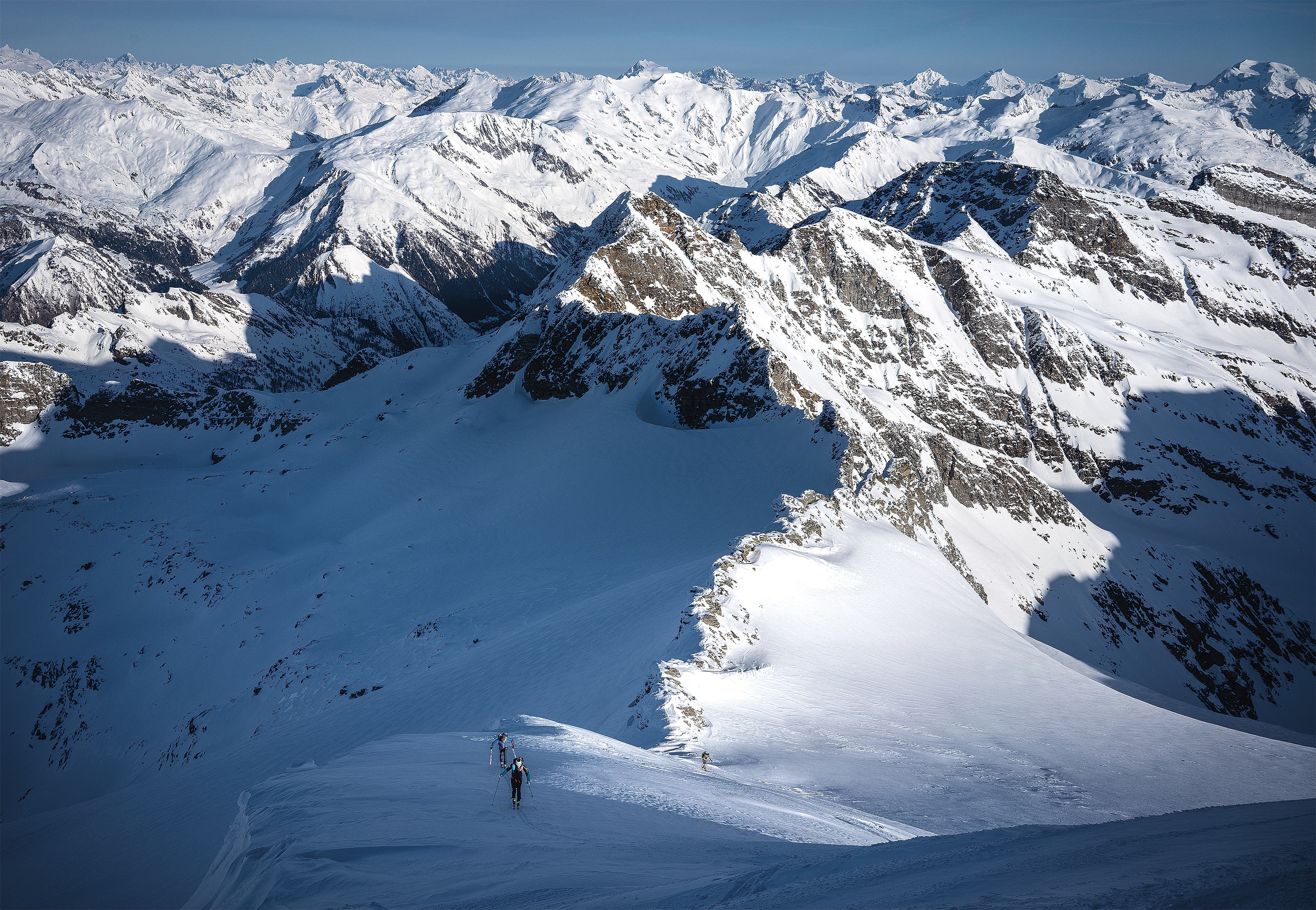 Tamara Lunger, Philipp Reiter, and David Wallmann nearing the summit of Rheinwaldhorn in Switzerland.