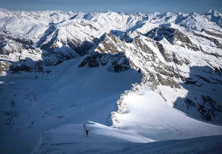 UPHILL_226_SMILEY. Tamara Lunger, Philipp Reiter, and David Wallmann nearing the summit of Rheinwaldhorn in Switzerland.