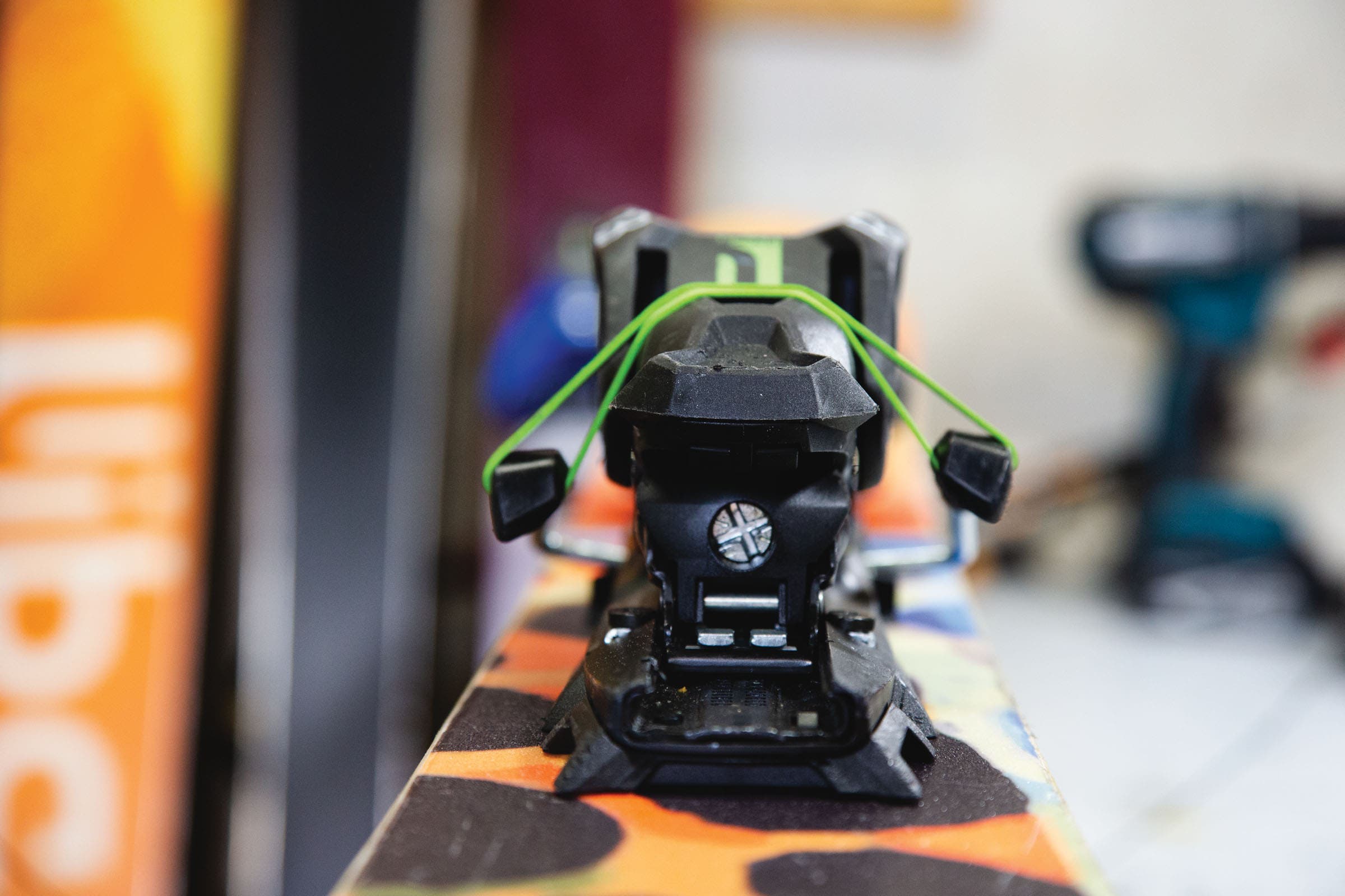 Prepping skis for waxing.