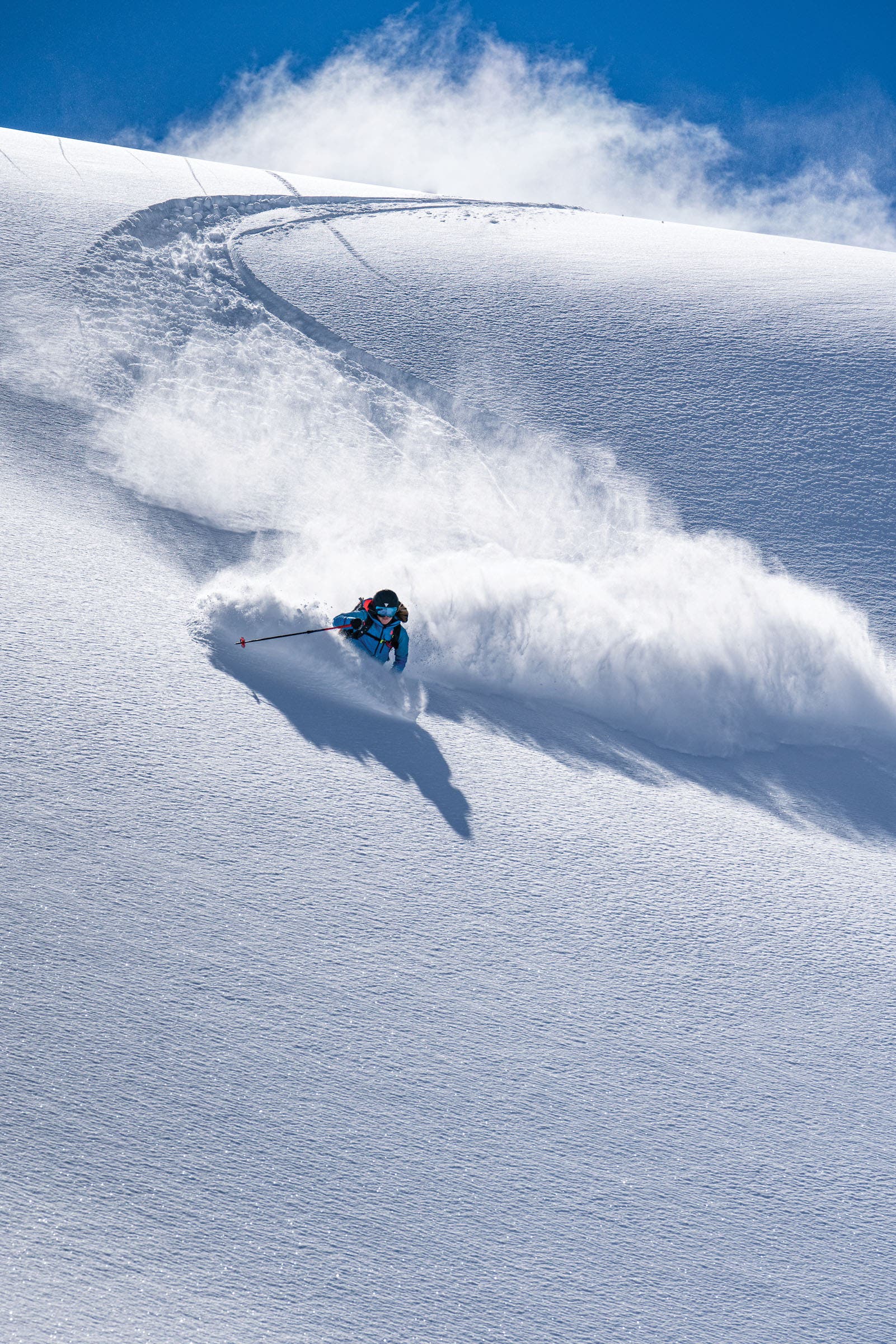 SNW70-20190319_WM_HH_Chamonix_CamMcLeod_1103 Erin Mielzynski skiing waist-deep powder.