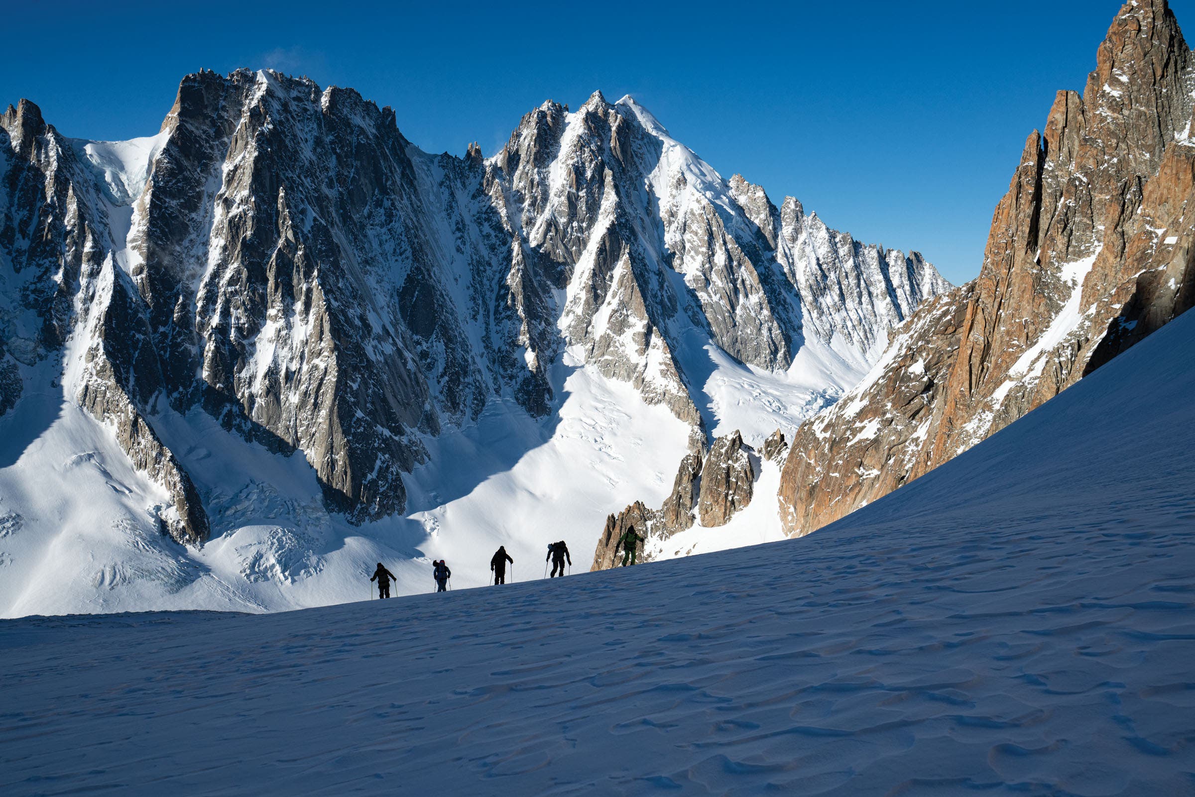 SNW70-20190321_WM_HH_Chamonix_CamMcLeod_1137 The crew pushes to the summit of the Argentiere Glacier on a clear, early morning.