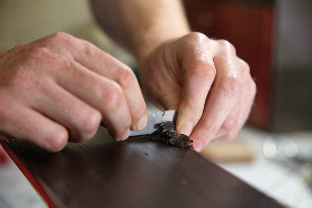 How to repair damaged ski base. Step 4: Let P-Tex cool, then plane away excess P-Tex.