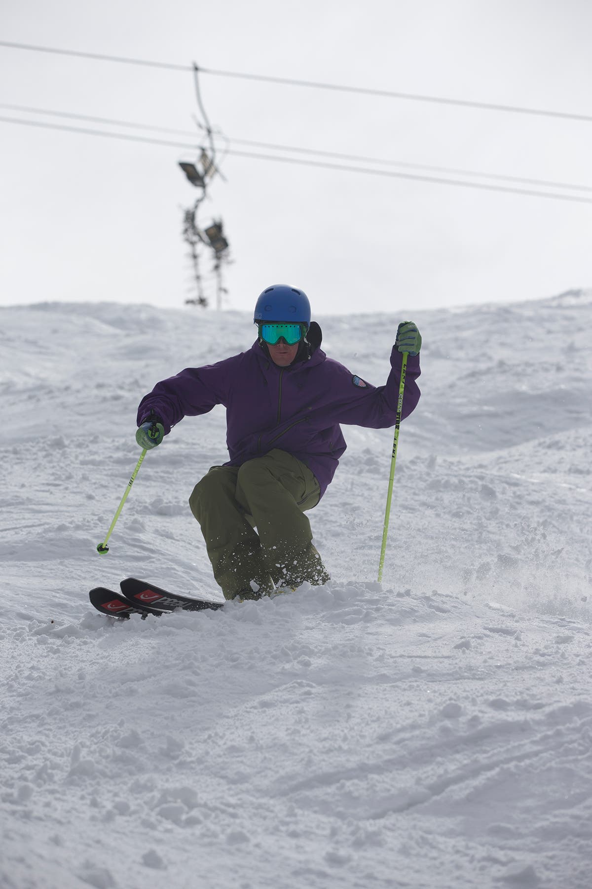 “Grip the boot.” Demonstrating proper mogul form.