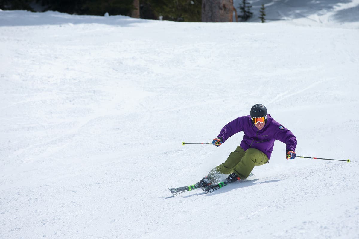 Carving into the turn.