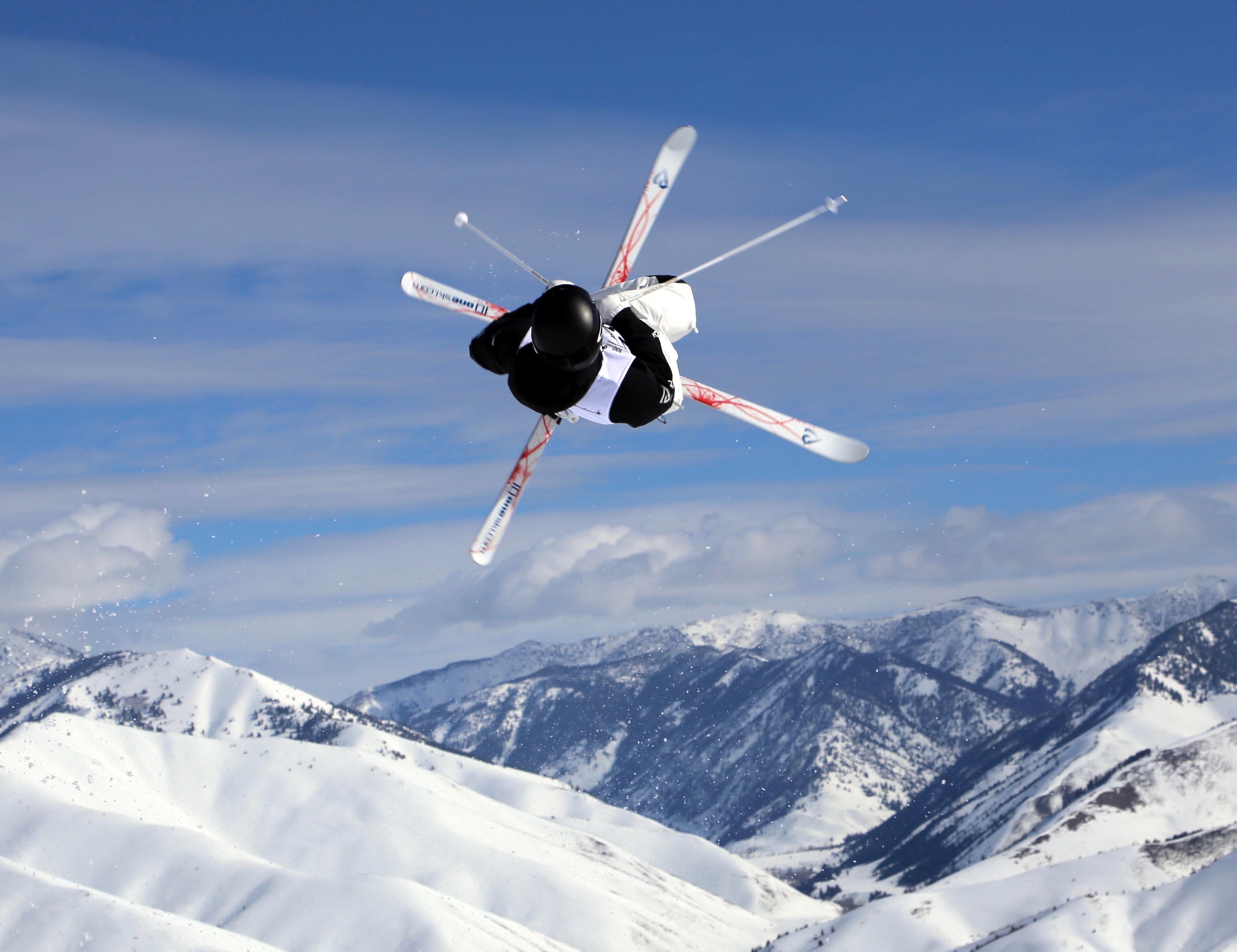 Nick Page hits a jump during a mogul run.