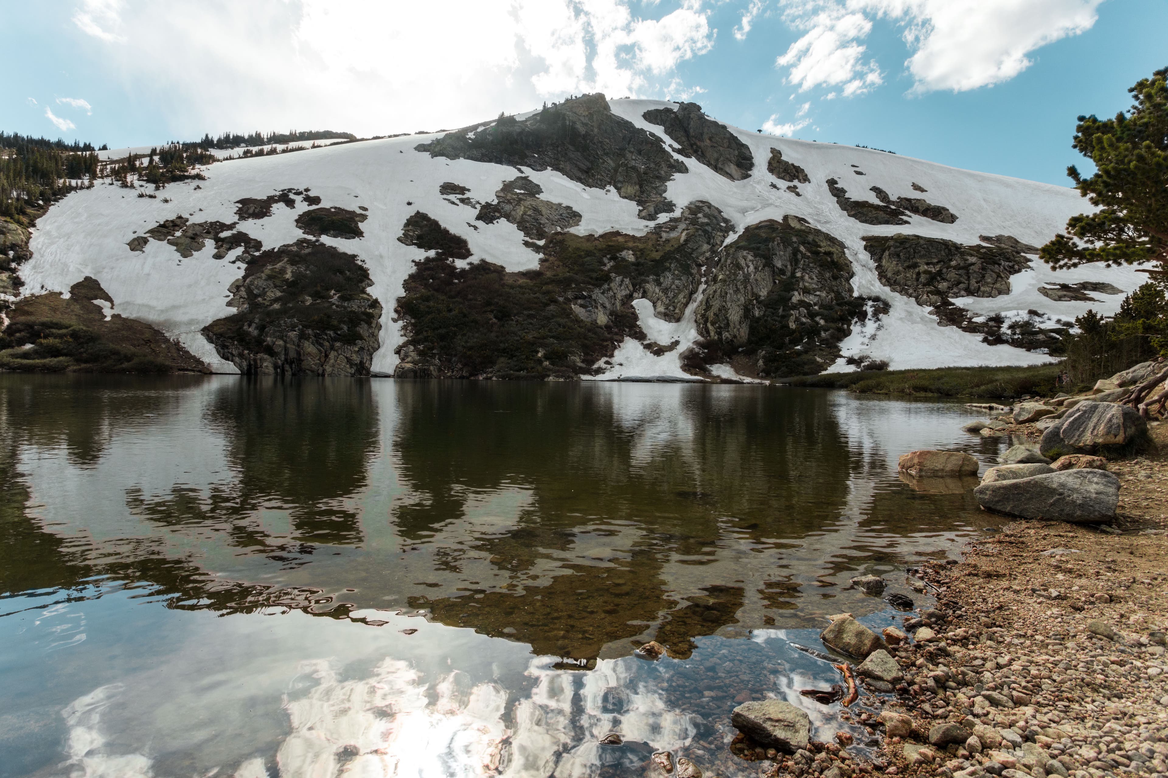 Lake at the bottom of St. Mary's Glacier, a popular summer skiing location in Colorado
