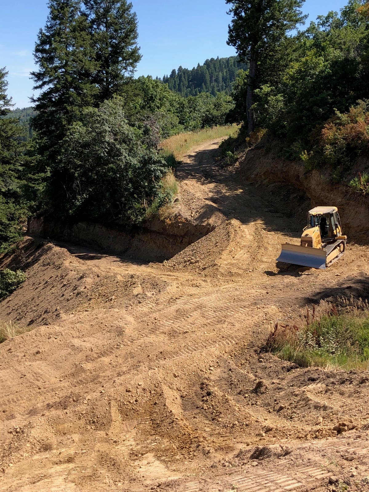 6_Trail Development at Nordic Valley Mountain crew working on creating ski trails at Nordic Valley.