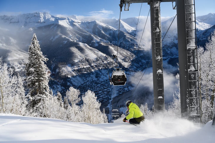 SKI1220-EC2-Intro3-SkiGondola Skiing under the Telluride Gondola