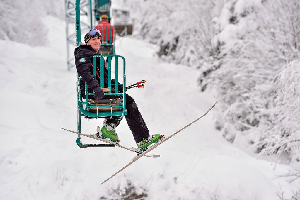 Skier on Mad River Glen single chairlift