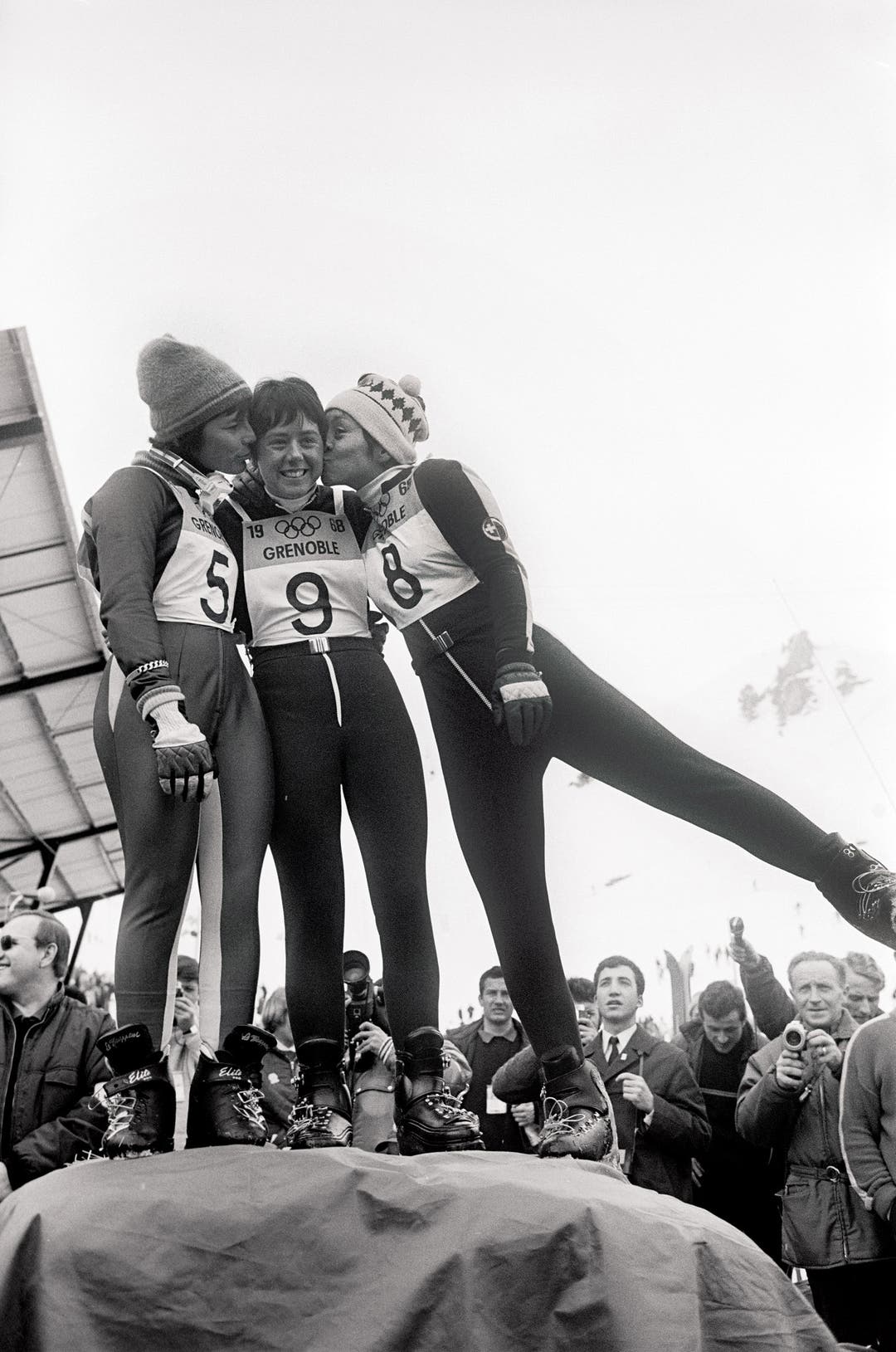 Archival photo of Nancy Greene on the podium of the Grenoble Olympics