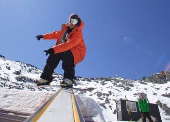Photographer Chris Hocking tries to get his best shot of the Whites at Falls Creek.