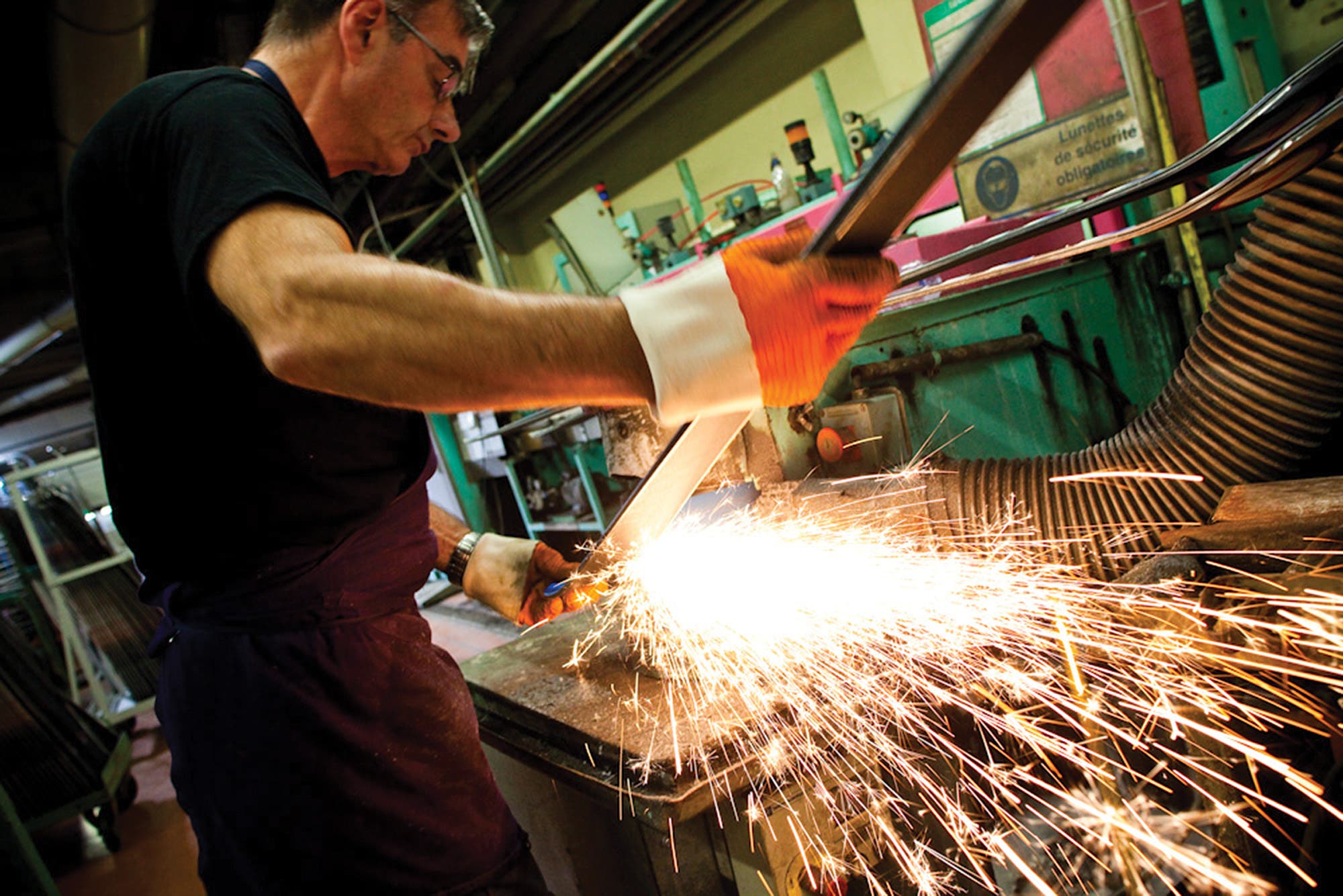 "Rossignol employee working on skis with sustainability goals kept in mind."