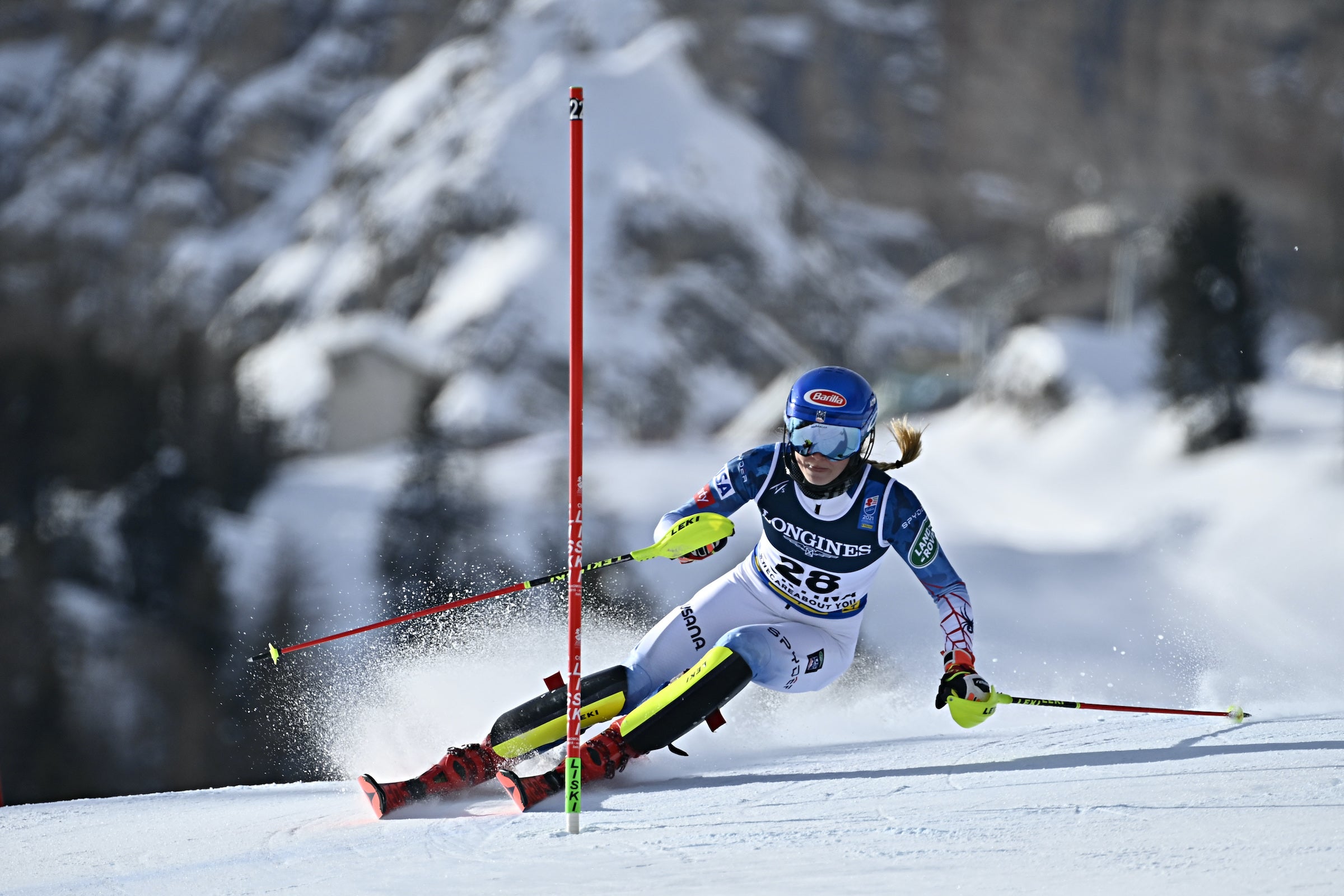 Mikaela Shiffrin knocks down a slalom gate in Cortina