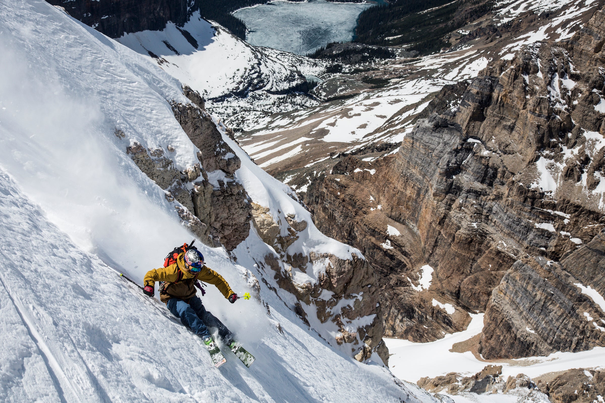Pro skier Johny Collinson skis a steep line in Banff National Park